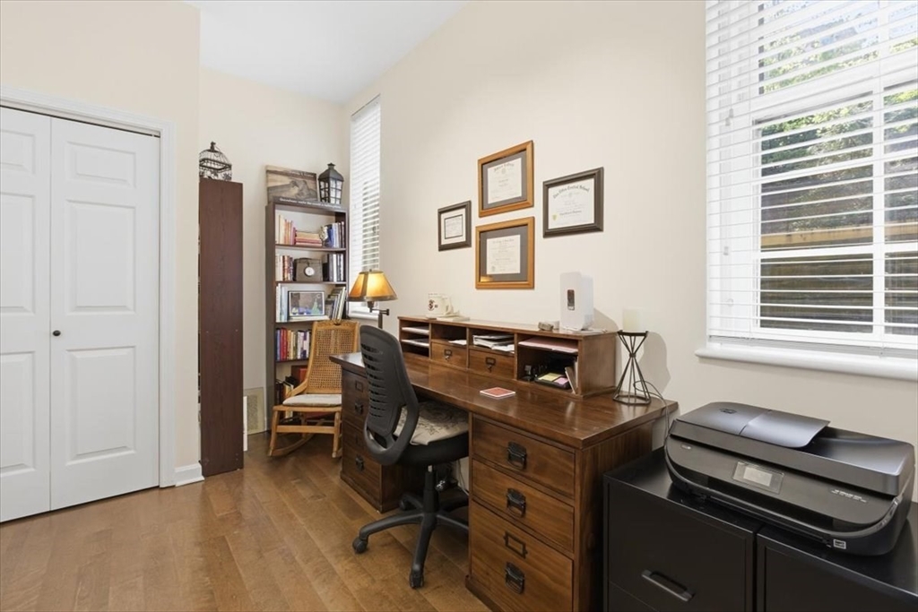 65 Glen Road, Unit H1 Brookline, MA 02445 - Photo 30 of 39 a view of a workspace with furniture and a window