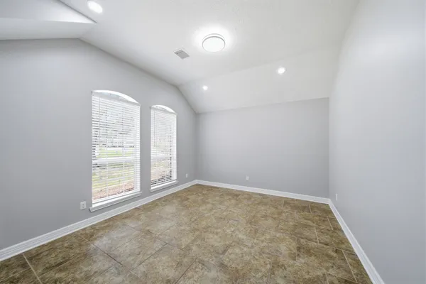 an empty room with windows