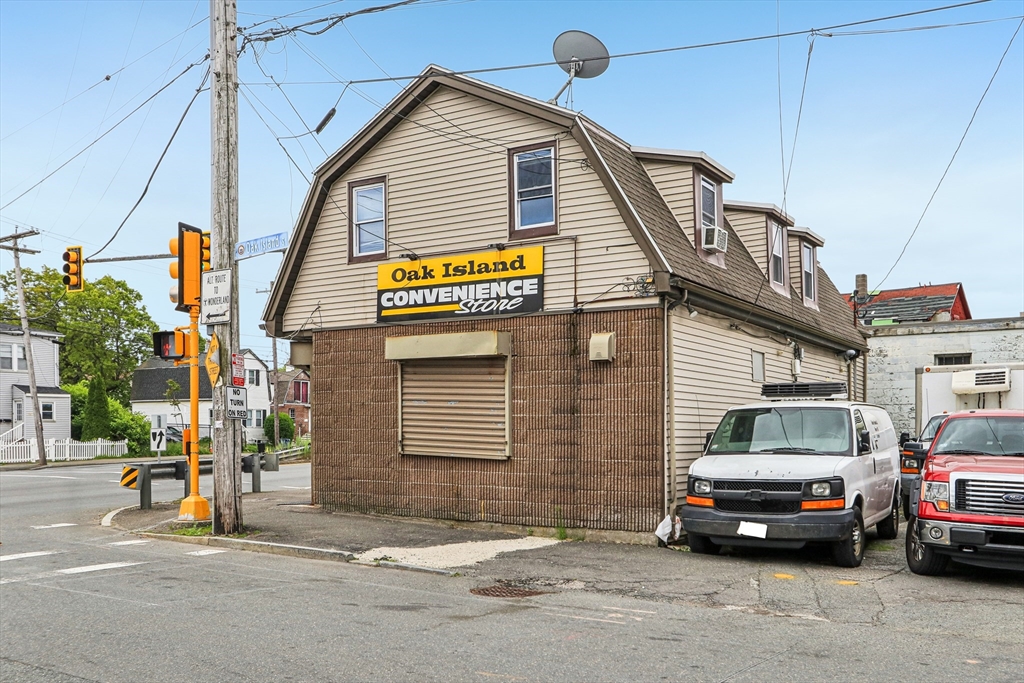 831 North Shore Road Revere, MA 02151 - Photo 2 of 24 a view of a car park in front of a house
