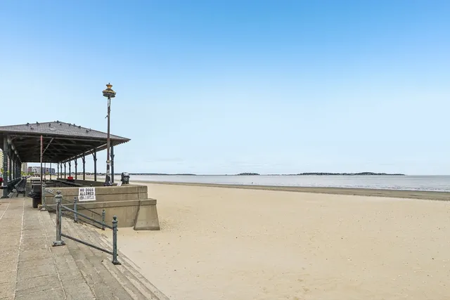 a room with a table and chairs
