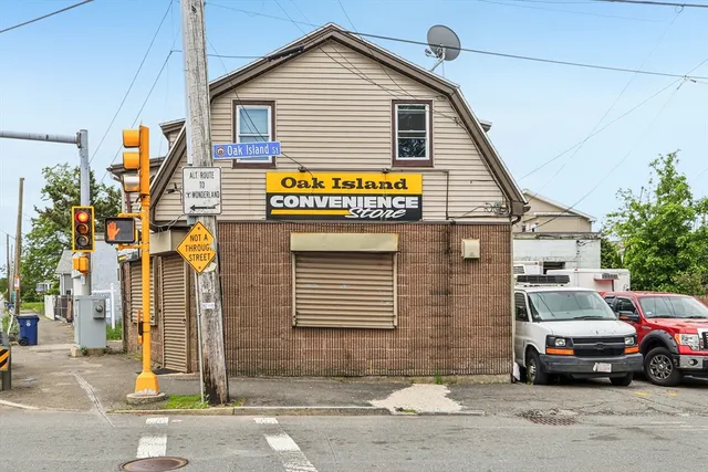 a view of a house with a parking space