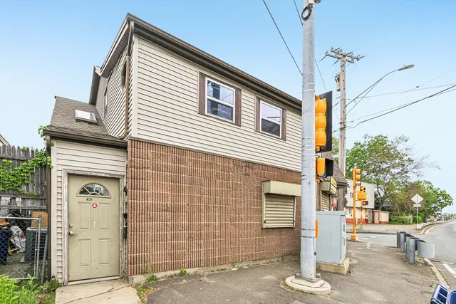 a front view of a house with parking