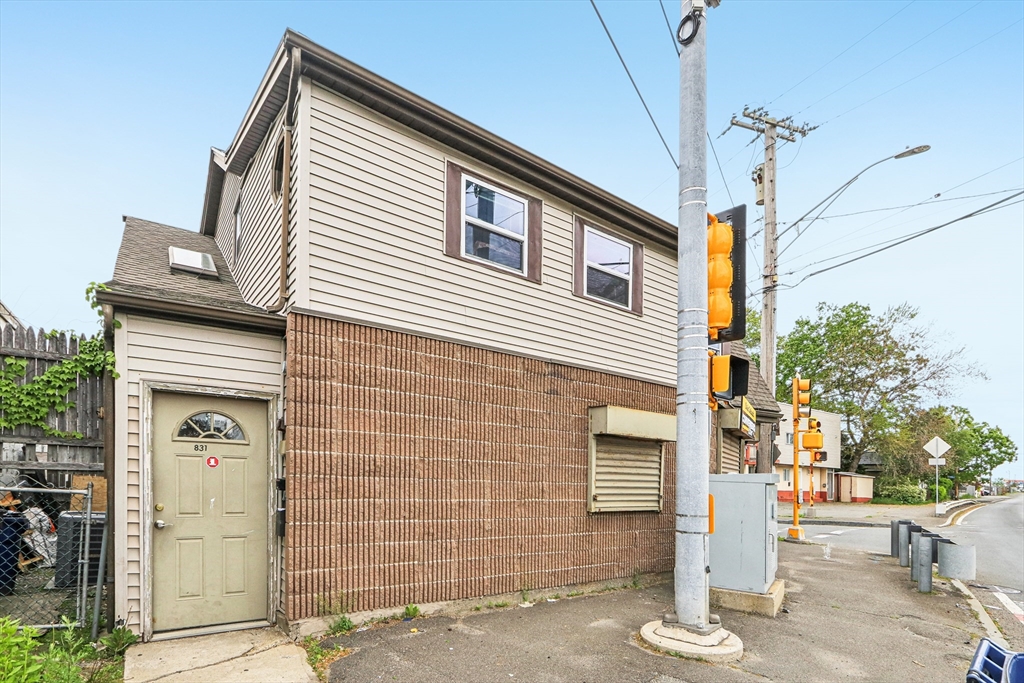 831 North Shore Road Revere, MA 02151 - Photo 9 of 24 a front view of a house with parking