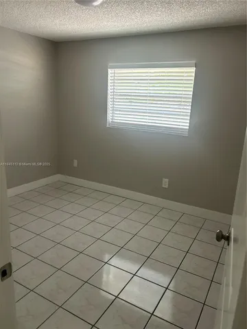 a view of a room and window