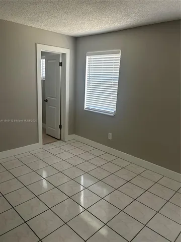 a view of a room and window