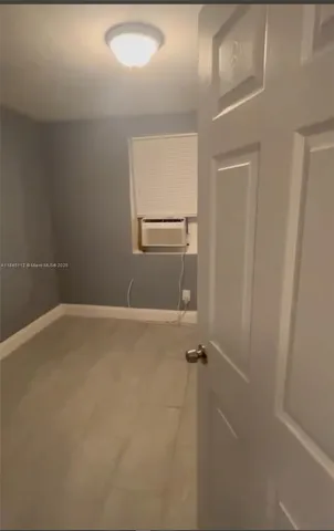 a view of a room with rack on the wall