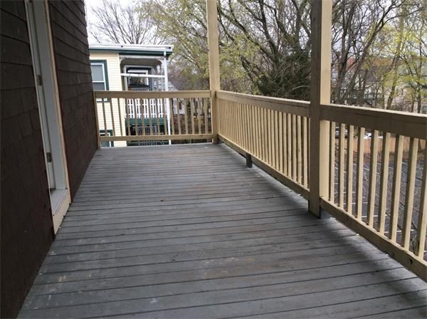 15 Romsey Street, Unit 3 Boston, MA 02125 - Photo 14 of 14 a view of a balcony with wooden floor