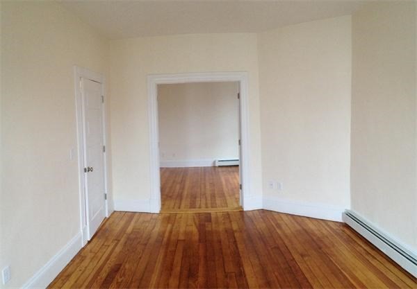 15 Romsey Street, Unit 3 Boston, MA 02125 - Photo 4 of 14 a view of wooden floor in a room