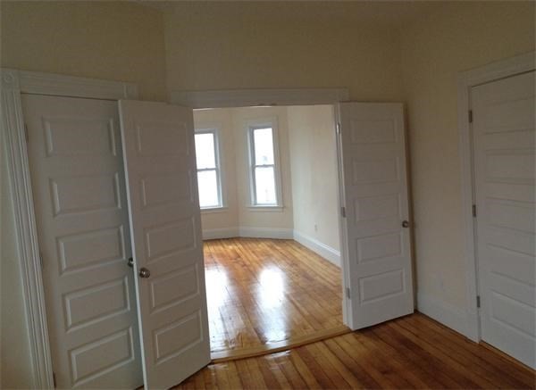 15 Romsey Street, Unit 3 Boston, MA 02125 - Photo 6 of 14 a view of hallway with wooden floor