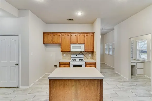 view of kitchen with wooden floor