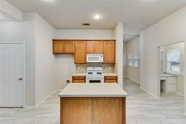 view of kitchen with wooden floor