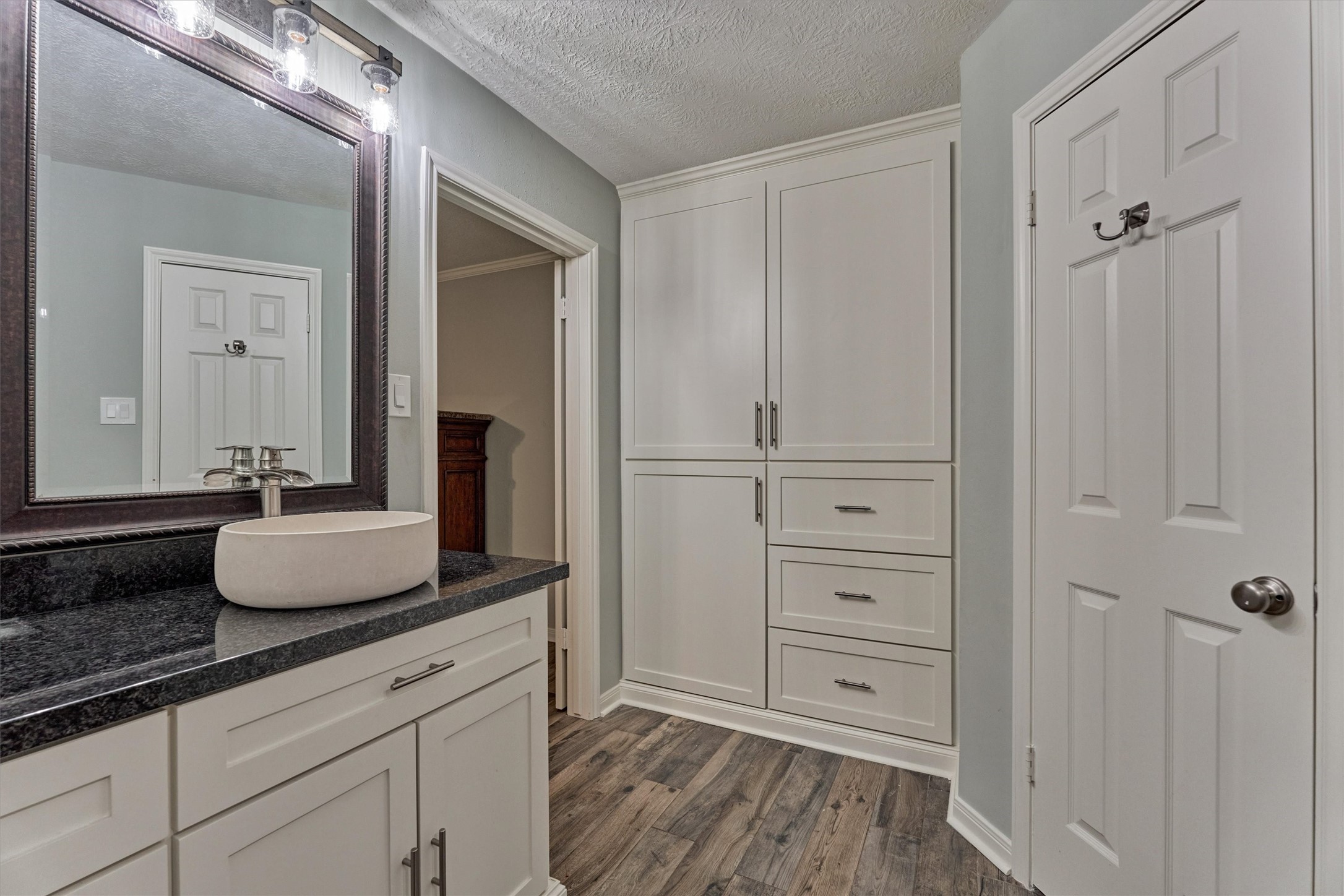 6522 Castle Pine Lane Spring, TX 77379 - Photo 15 of 49 a bathroom with a granite countertop sink a vanity and a mirror