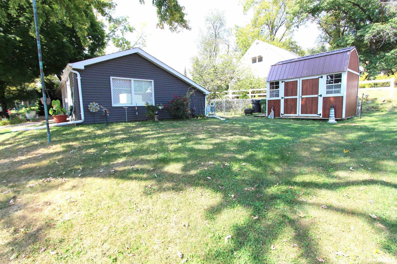 1330 Florence Avenue Clinton, IA 52732 - Photo 20 of 20 a view of a house with a yard and large tree