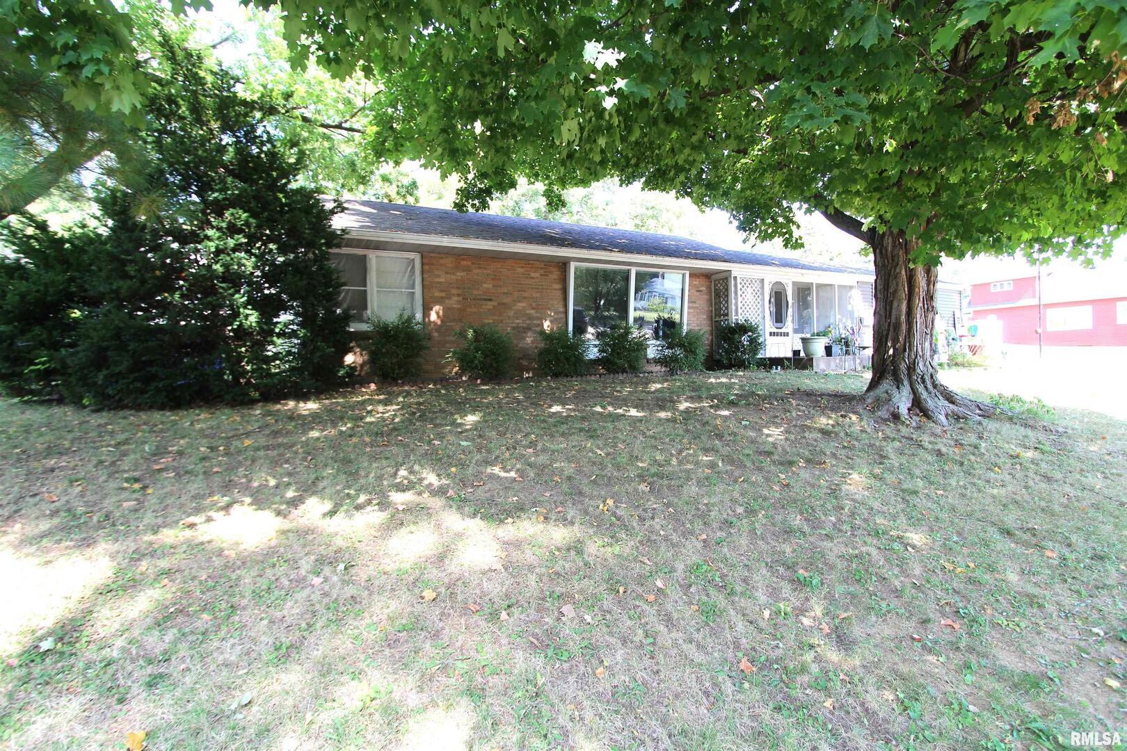 1330 Florence Avenue Clinton, IA 52732 - Photo 2 of 20 a view of a house with a yard