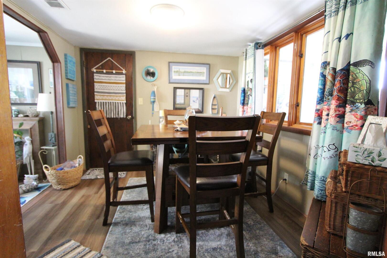 1330 Florence Avenue Clinton, IA 52732 - Photo 6 of 20 a view of a dining room with furniture window and outside view