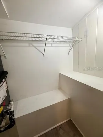 a view of small space with racks on the wall