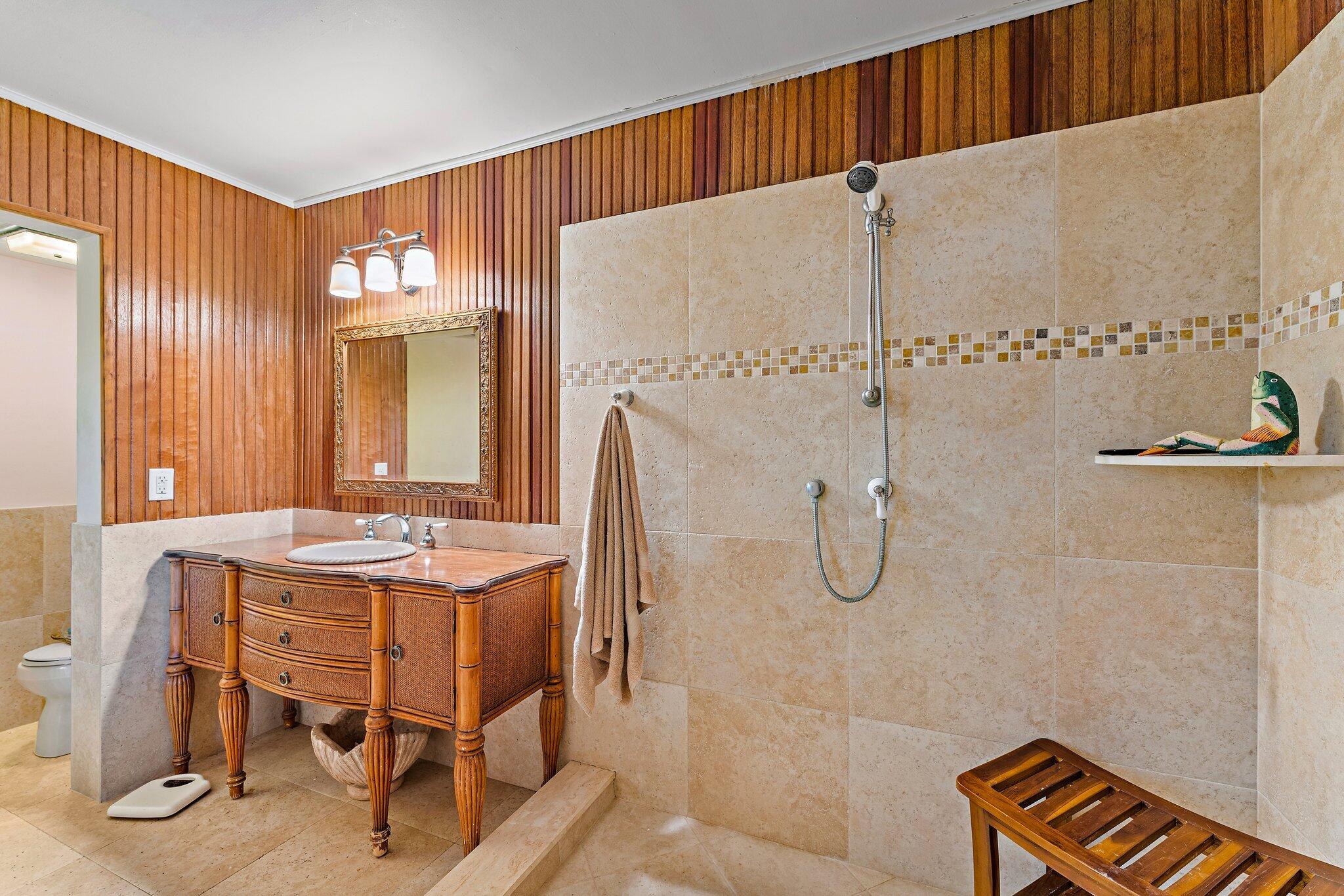 1605 Highway 1, Unit SL 5F Jupiter, FL 33477 - Photo 33 of 35 a bath room with a table and chairs