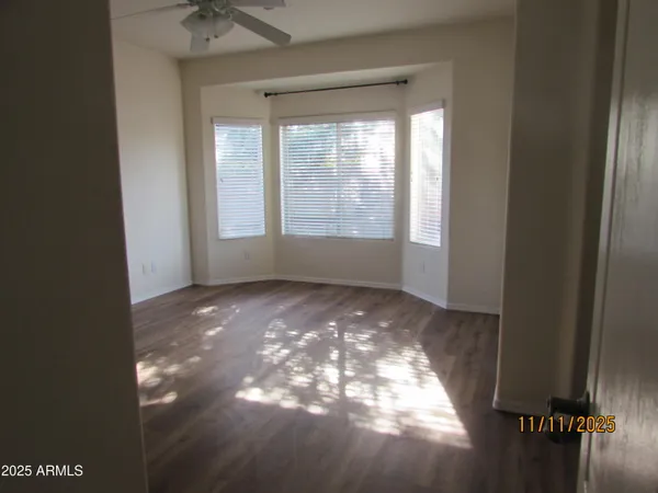 a view of an empty room and window