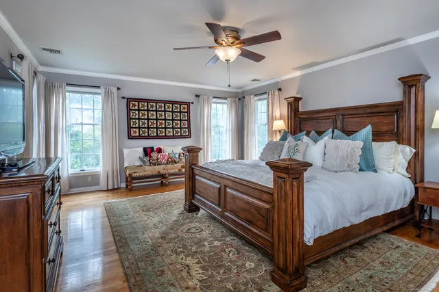 a bed room with a bed and a couch