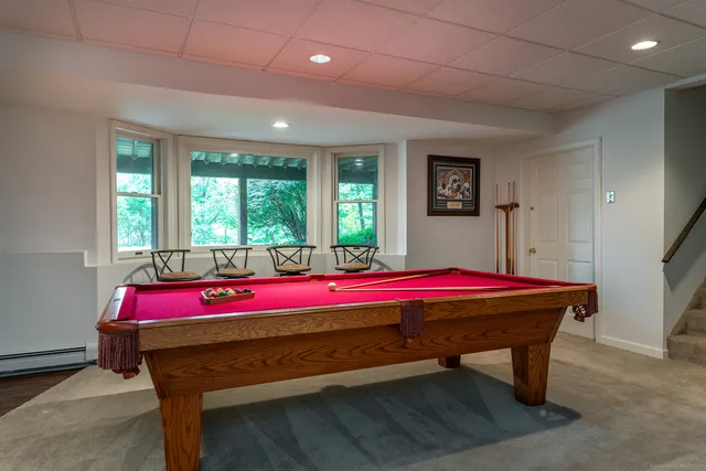 a room with a bed and a table