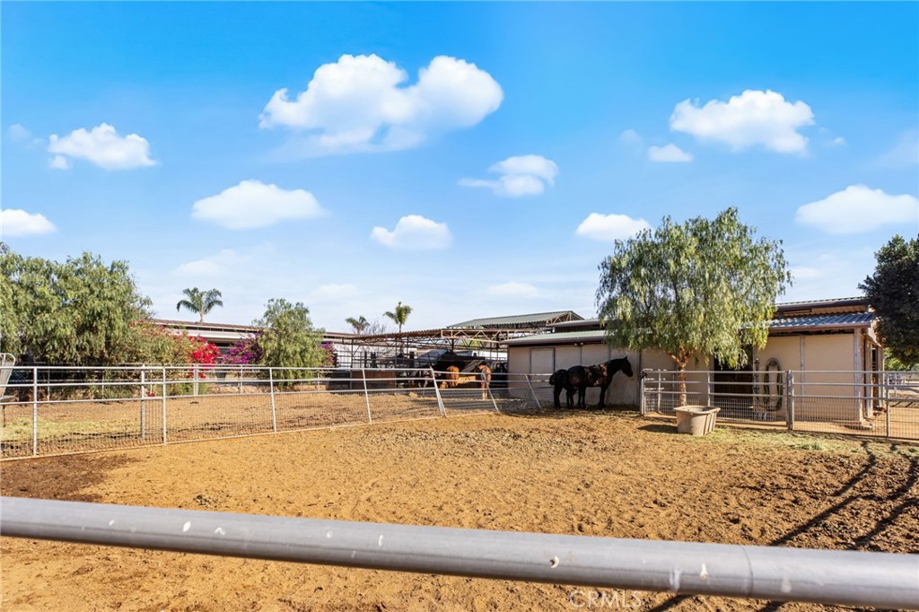 3243 Temescal Avenue Norco, CA 92860 - Photo 17 of 56 a view of a swimming pool with outdoor seating