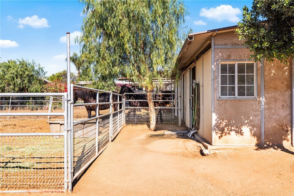 3243 Temescal Avenue Norco, CA 92860 - Photo 20 of 56 a view of a house with backyard and sitting area