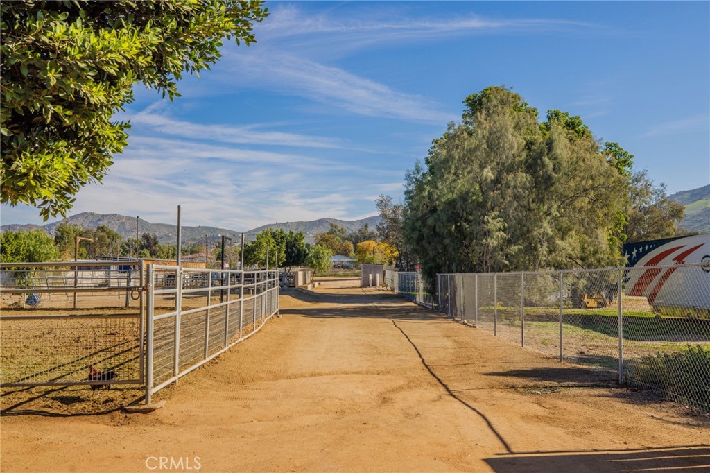 3243 Temescal Avenue Norco, CA 92860 - Photo 21 of 56 a view of a swimming pool with a patio