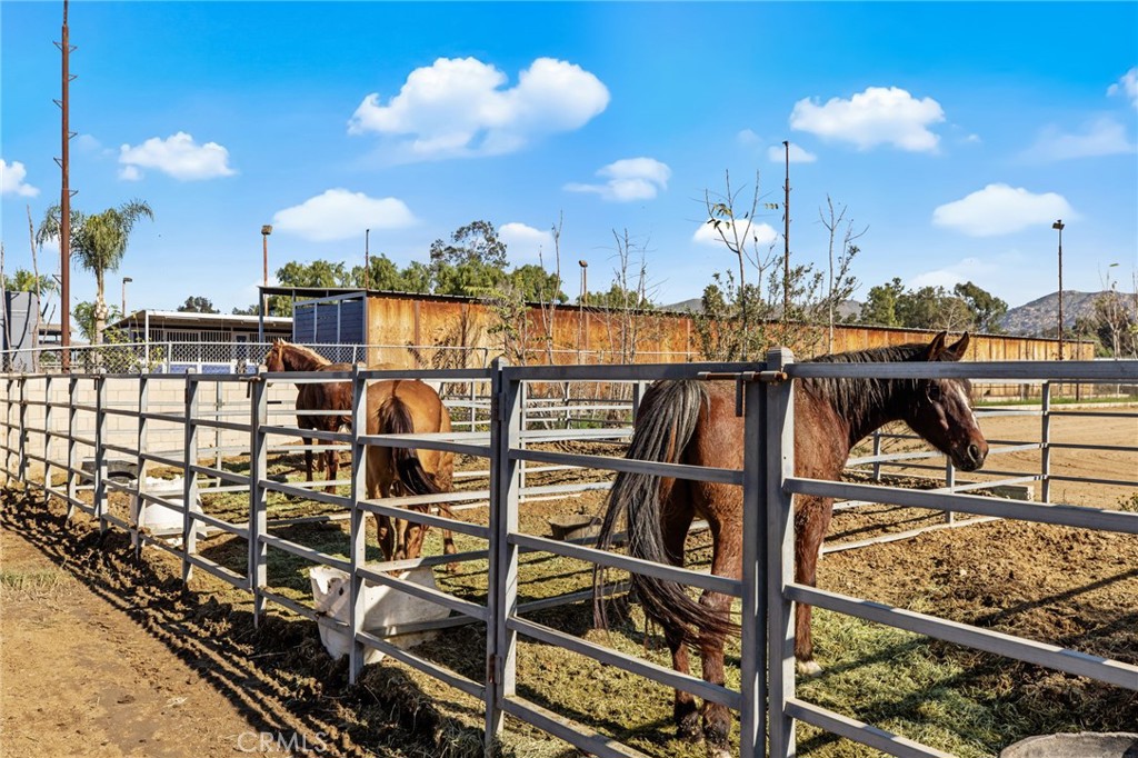 3243 Temescal Avenue Norco, CA 92860 - Photo 36 of 56 a view of a balcony with dining table and chair