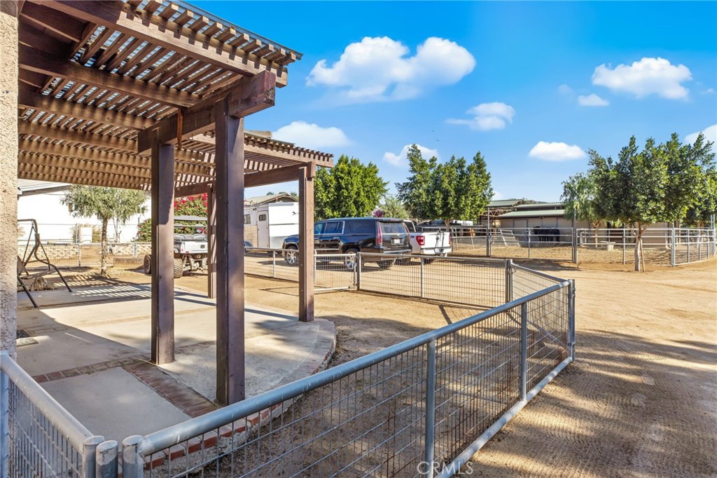3243 Temescal Avenue Norco, CA 92860 - Photo 47 of 56 a view of a swimming pool with seating space