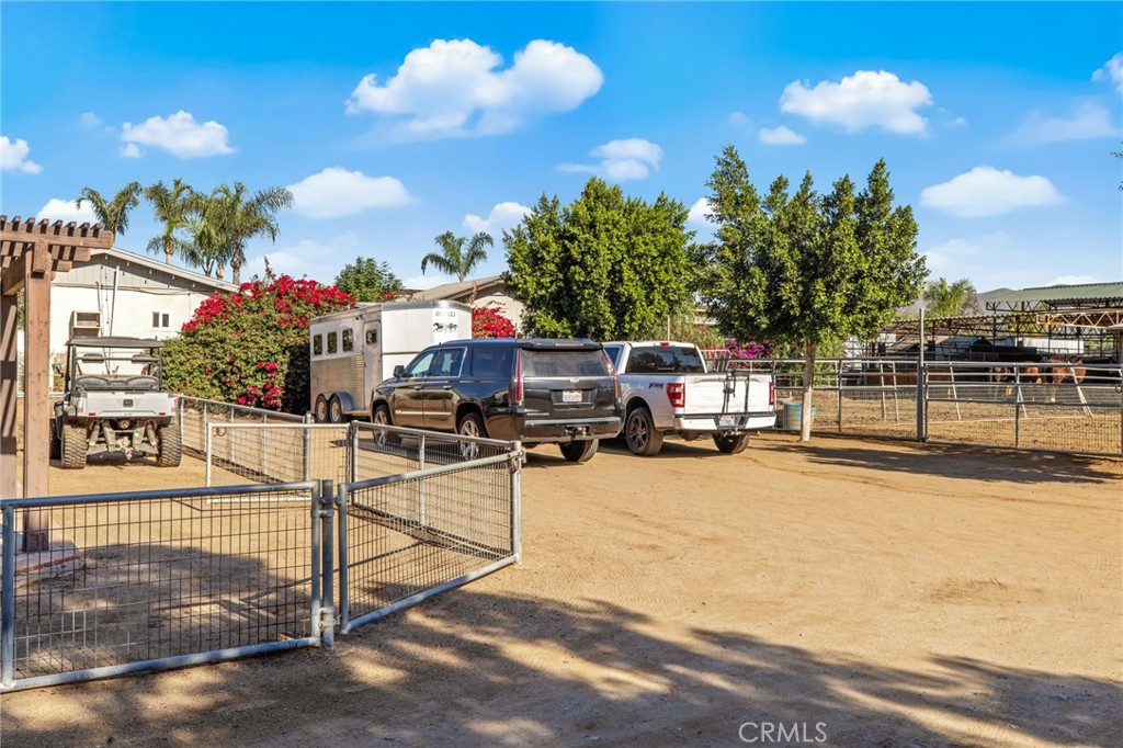 3243 Temescal Avenue Norco, CA 92860 - Photo 49 of 56 a view of a swimming pool with a patio