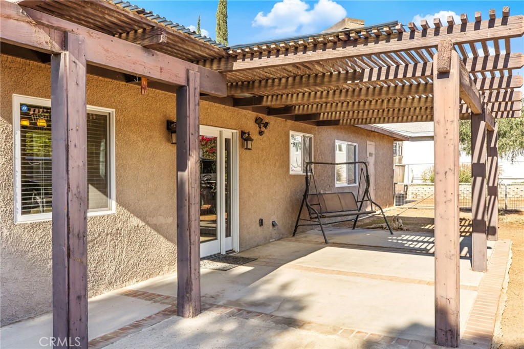 3243 Temescal Avenue Norco, CA 92860 - Photo 51 of 56 a view of a porch with a table and chairs