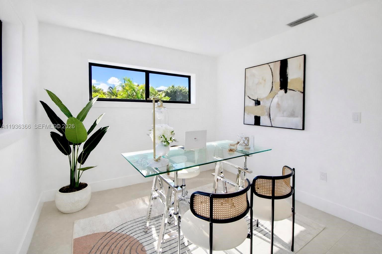 7904 Southwest 139th Court Miami, FL 33183 - Photo 12 of 33 a living room with furniture and a potted plant