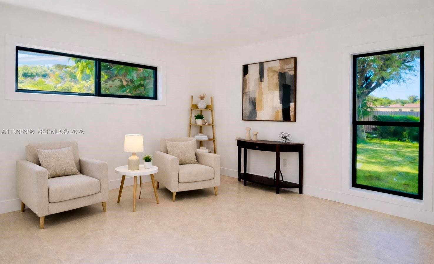 7904 Southwest 139th Court Miami, FL 33183 - Photo 13 of 33 a living room with furniture and a window