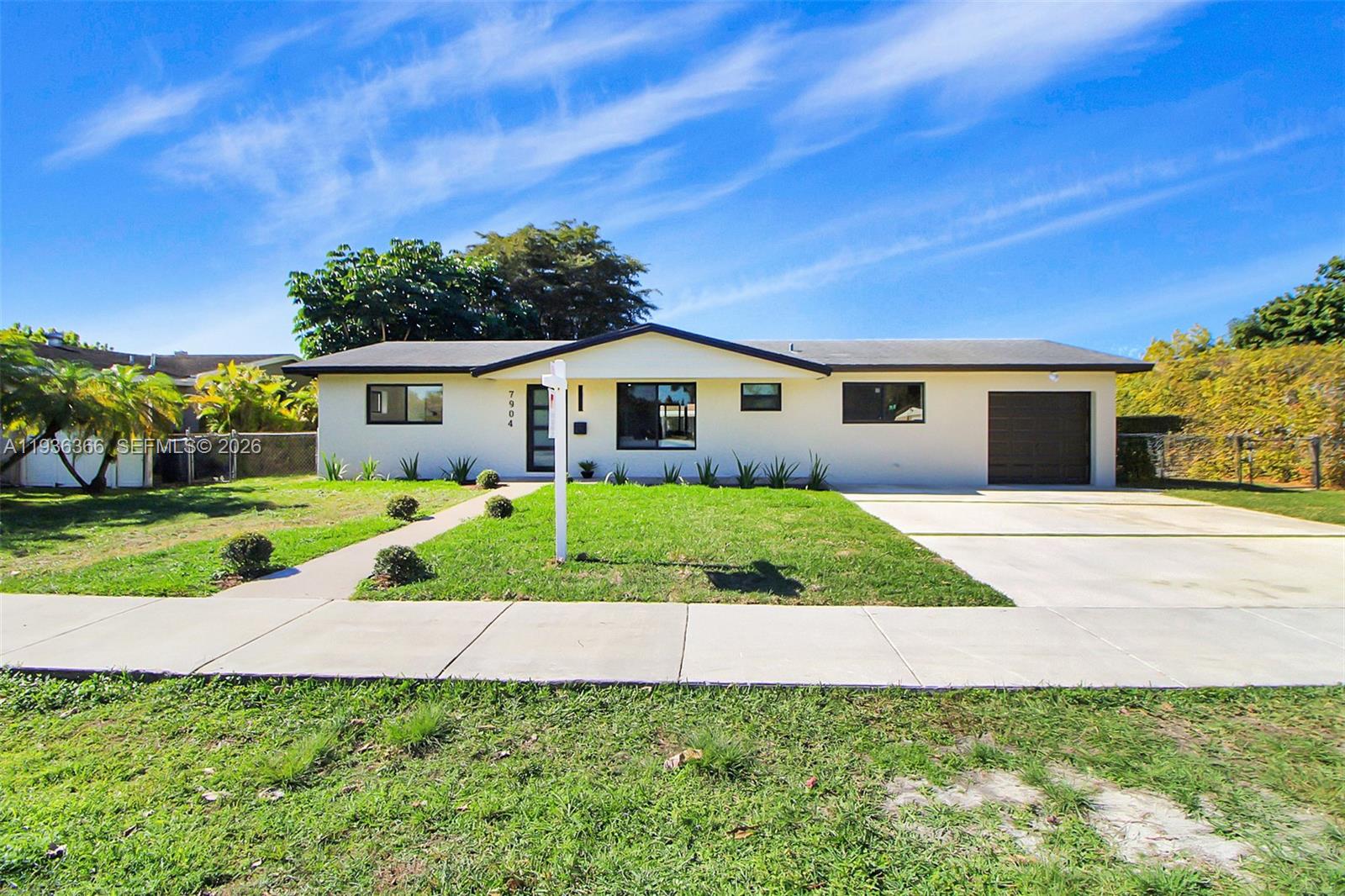 7904 Southwest 139th Court Miami, FL 33183 - Photo 22 of 33 a view of house with a yard