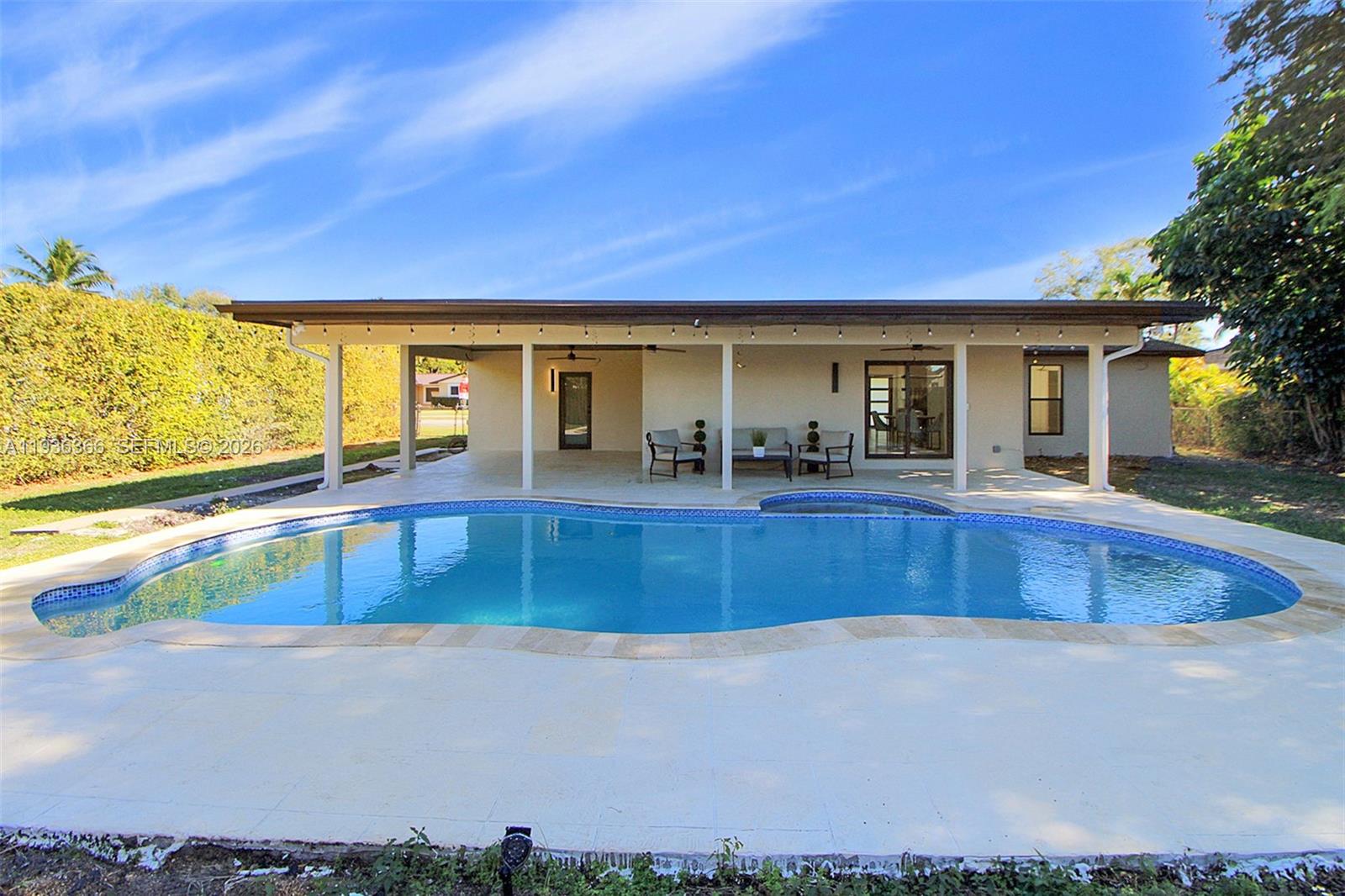 7904 Southwest 139th Court Miami, FL 33183 - Photo 30 of 33 a view of a house with swimming pool