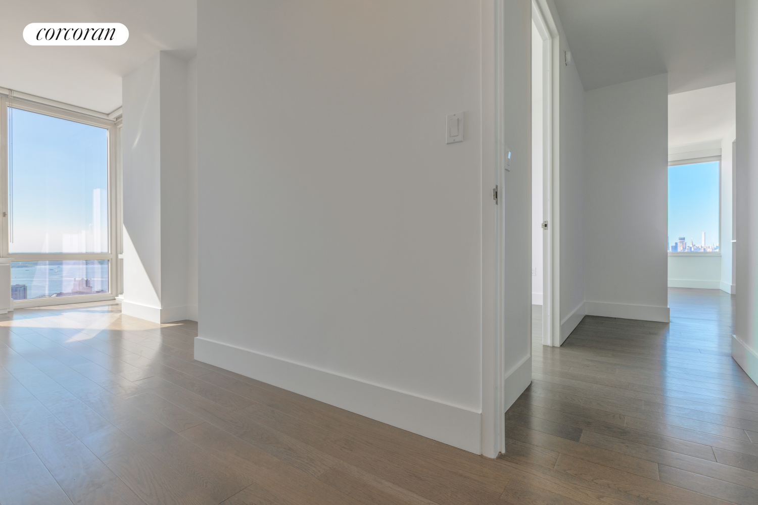 388 Bridge Street, Unit 43H Brooklyn, NY 11201 - Photo 11 of 14 a view of a hallway with wooden floor