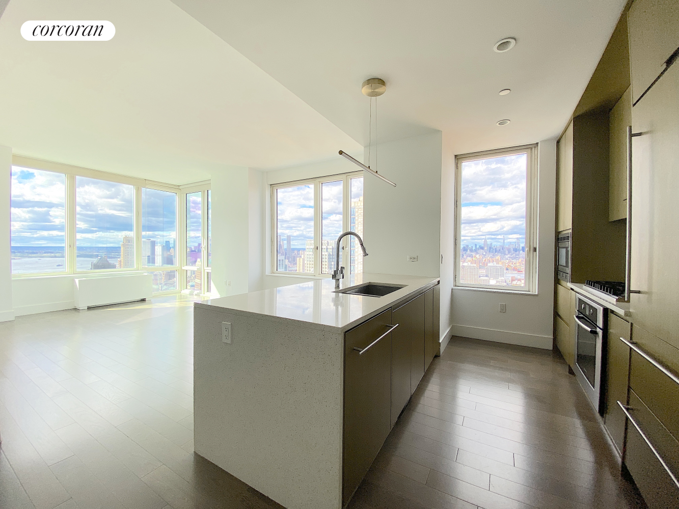 388 Bridge Street, Unit 43H Brooklyn, NY 11201 - Photo 5 of 14 a view of a kitchen with a sink and windows