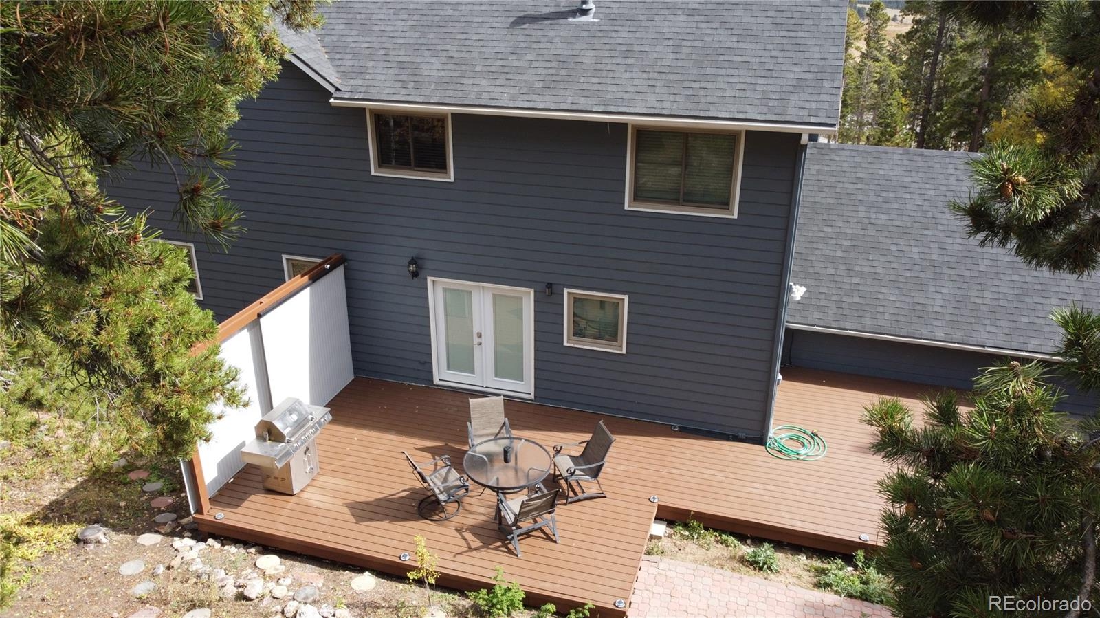 265 Caesar Road Black Hawk, CO 80422 - Photo 42 of 42 a backyard of a house with seating space