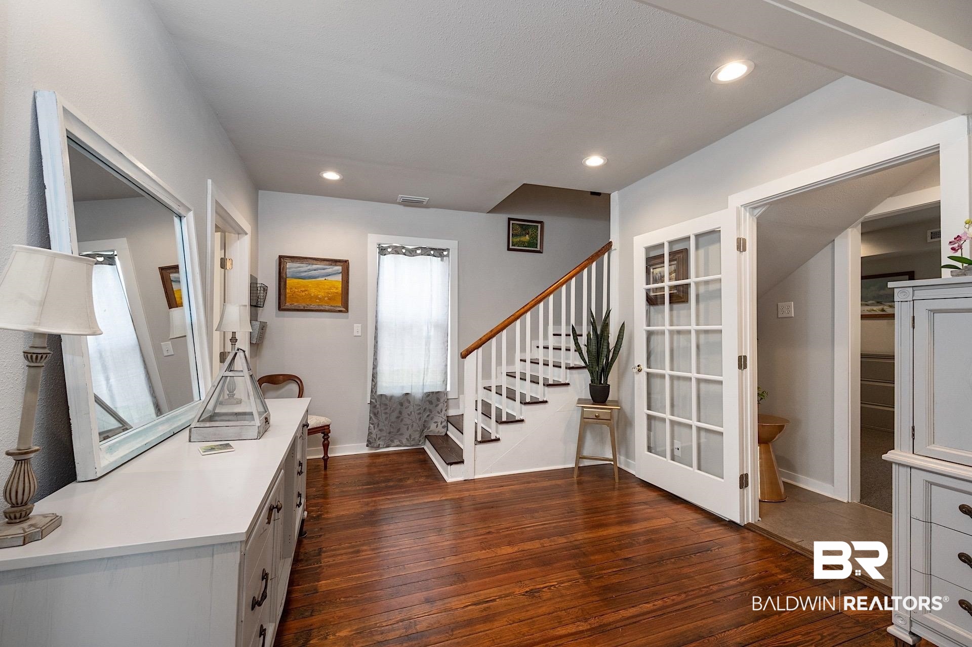 22051 Broad Street Silverhill, AL 36576 - Photo 14 of 28 Foyer entrance featuring dark wood-type flooring