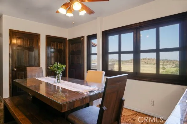 a dining room with furniture and window or wooden floor