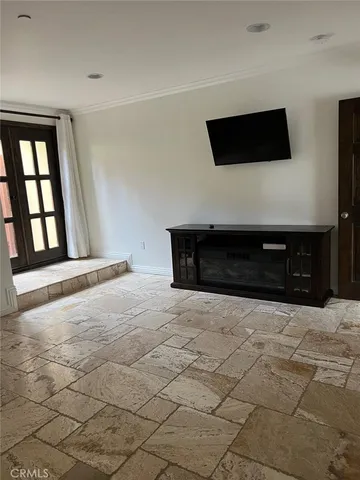 a kitchen with stainless steel appliances a stove a sink and a refrigerator