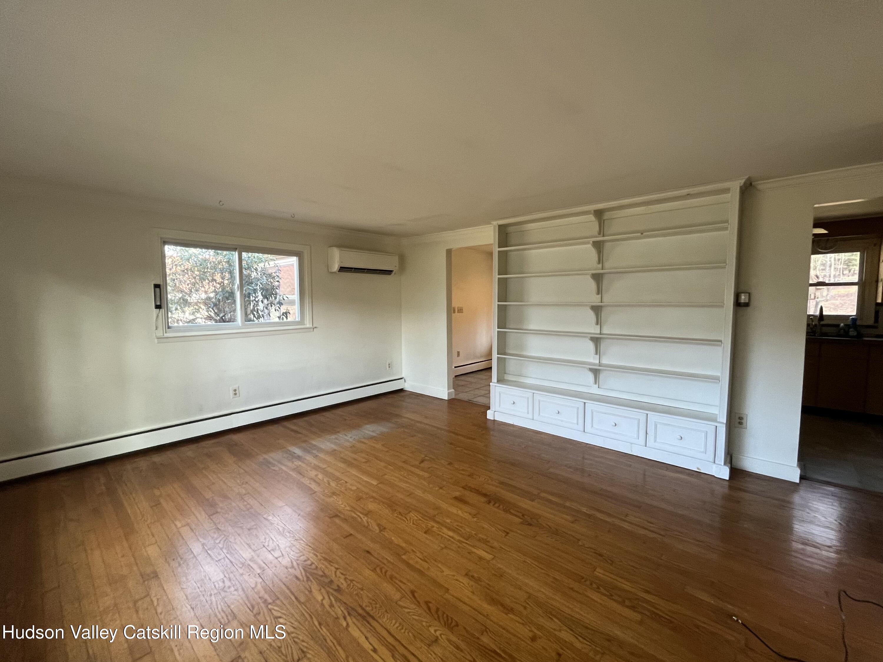 200 Van Vlierden Road Saugerties, NY 12477 - Photo 12 of 29 wooden floor in an empty room with a window