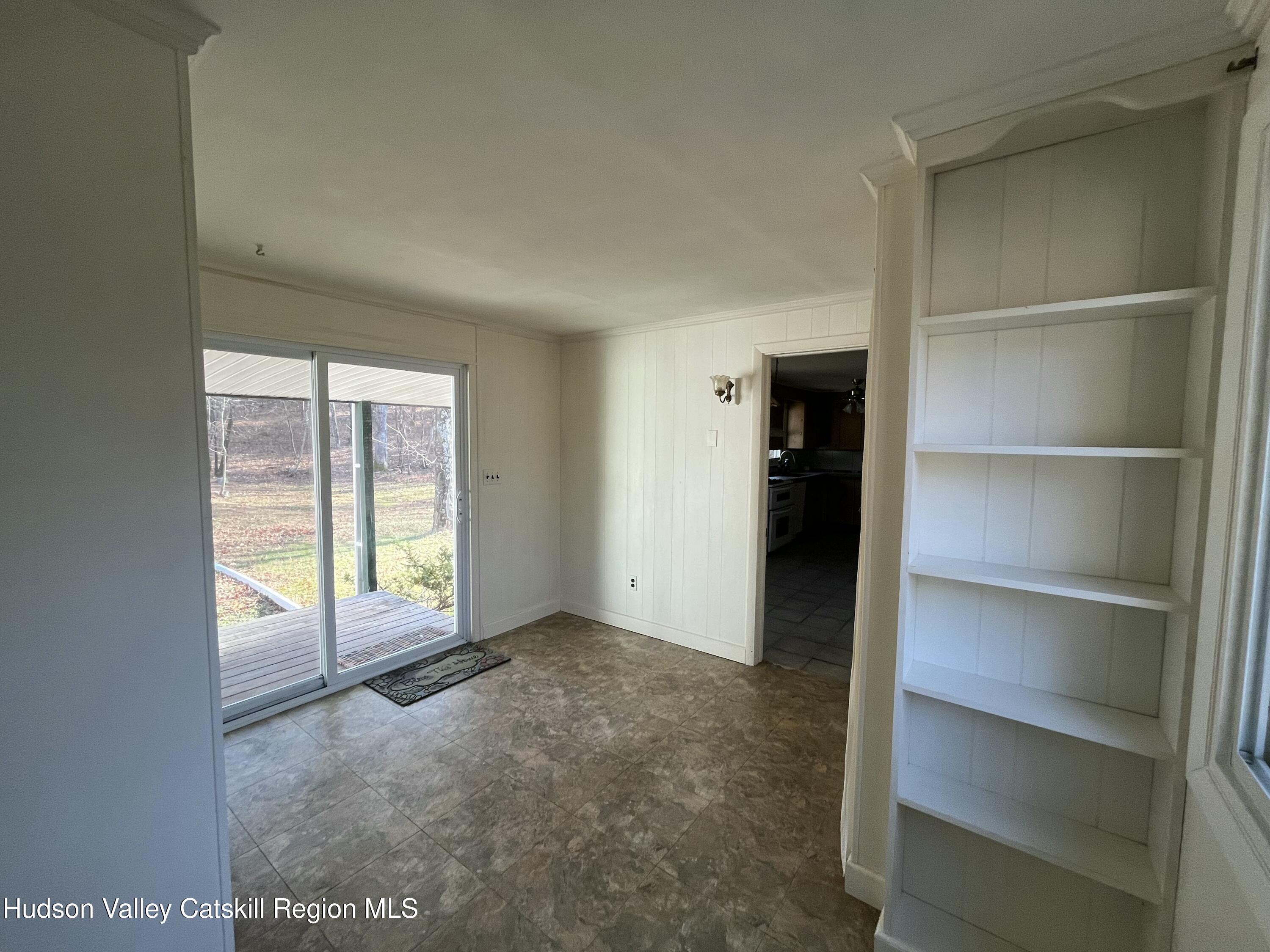 200 Van Vlierden Road Saugerties, NY 12477 - Photo 16 of 29 a view of an empty room with a window