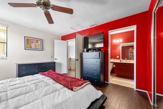 a bedroom with a bed and a closet