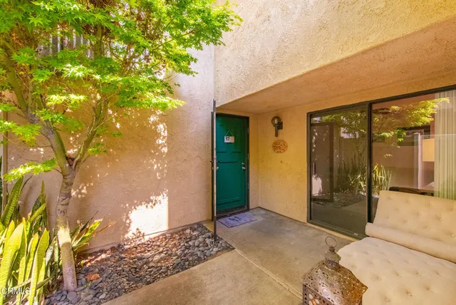 a balcony view with a outdoor space