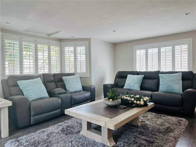 a living room with furniture and a couch