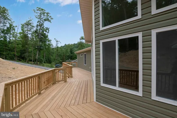 a view of outdoor space with chairs and couch