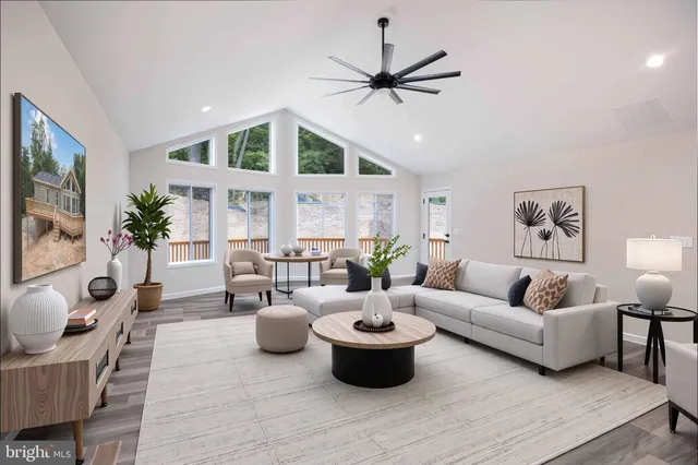 a kitchen with stainless steel appliances a refrigerator sink and microwave