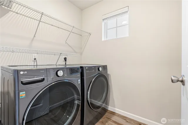 a utility room with dryer and washer