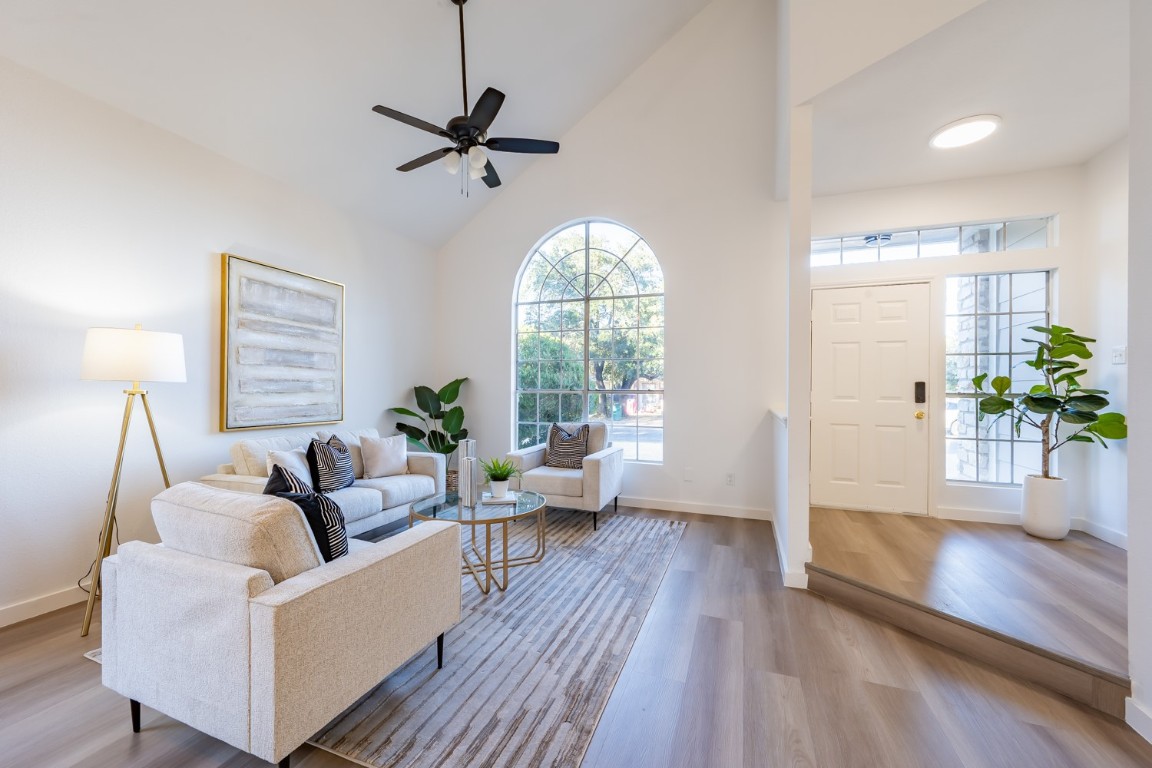 a living room with furniture and a window